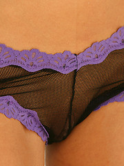 Carolyn Michelle teases in her black and purple see thru lingerie - Pics