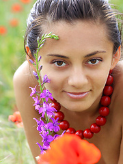 Sima enjoys a relaxing weekend,   sunbathing among the flowery fields for   her debut series. - Pics