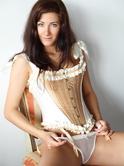 Lauren Crist takes off her sexy gold corset and panties exposing her exquisite womanly form