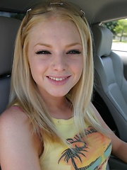 Blonde teen Skye Model shows off her tight teen body by her friends car - Pics