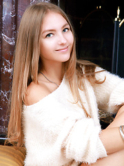 Izabel A poses naked with her slender body by the fireplace. - Pics