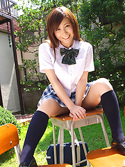 Schoolgirl Iyo Hanak poses at the open air in sexy skirt - Pics