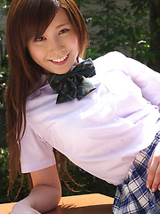 Schoolgirl Iyo Hanak poses at the open air in sexy skirt - Pics