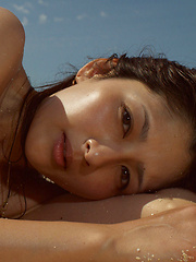 Neo Asian babe with hot curves comes from water like a goddess - Pics