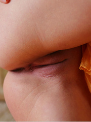 Colleen A playfully poses with gold, diaphanous shawl wrapped around her petite, nubile body with sun-kissed skin. - Pics