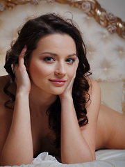 Ardelia A may look sweet and adorable but this cutie can lure you into lusty desires as she poses seductively all over the bed. - Pics