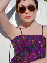 Sexy cool Zoe Voss in sun glasses strips off her purple dress sunbathing - Pics