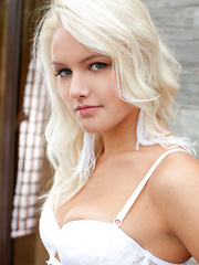 Karina O's beautiful blonde hair and stunning blue eyes accentuates her gorgeous body claid in dainty white lingerie. - Pics